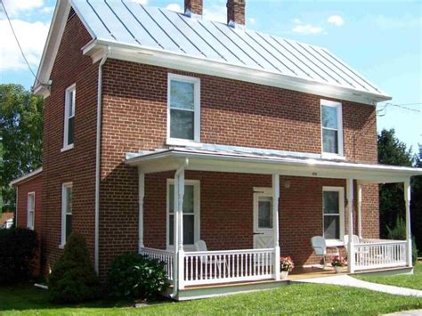 what color for a house with a brick metal roof|metal roof pictures brick house.